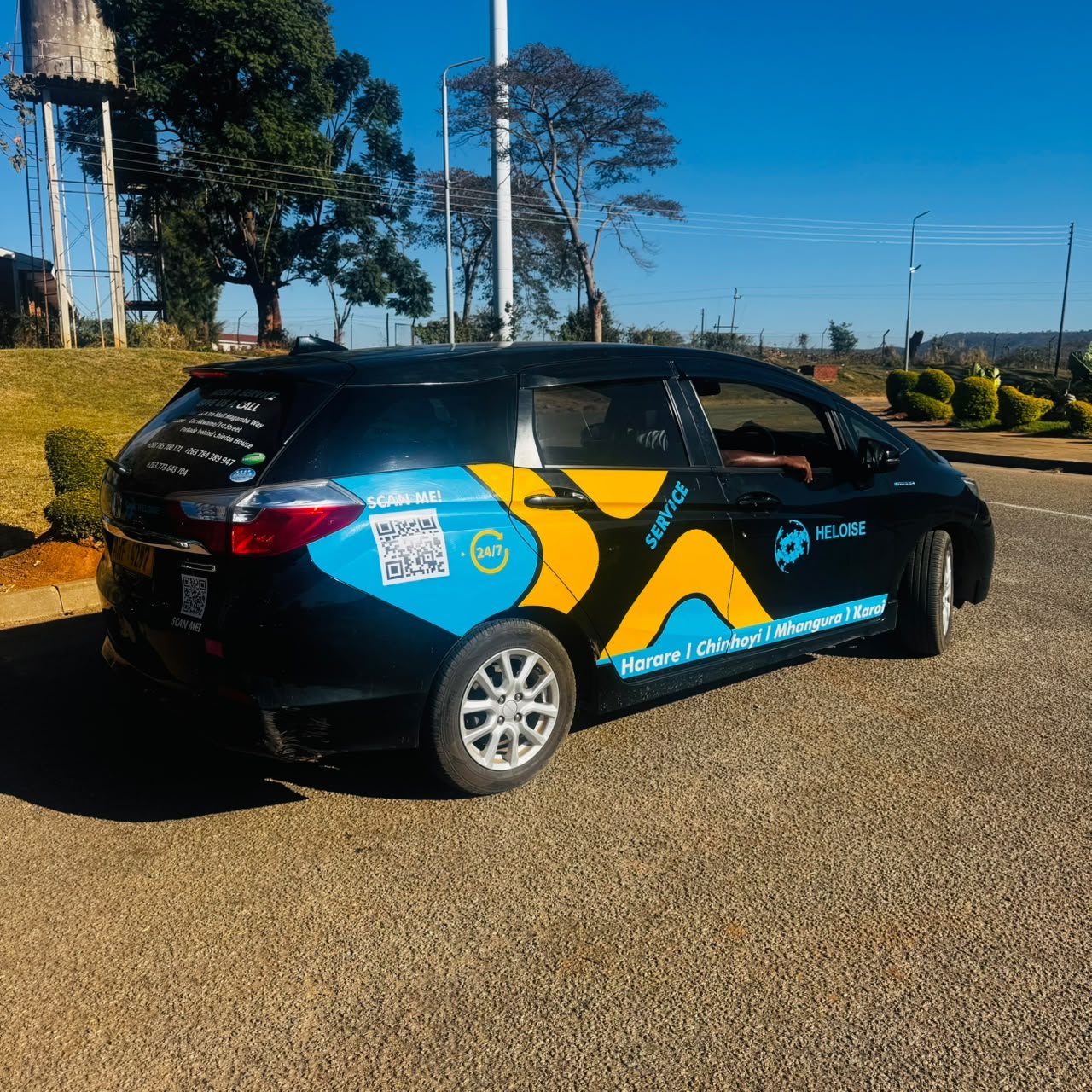Heloise Courier branded vehicle ready for route delivery